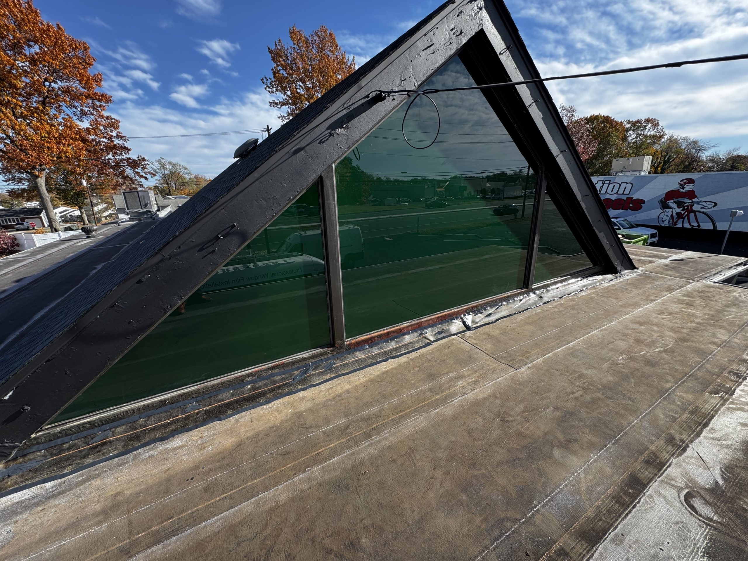Wenonah Green Initiative triangle gable window with green decorative film